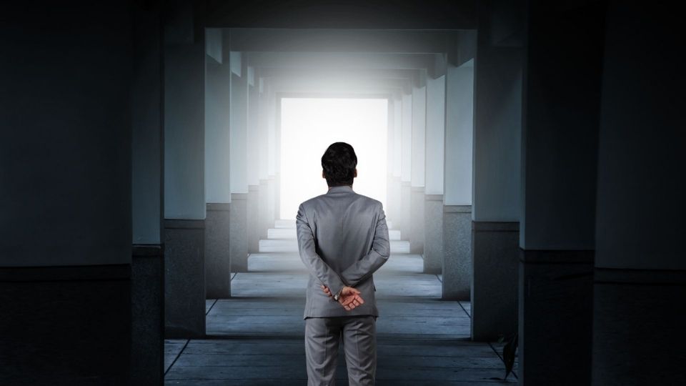 Man looking toward light