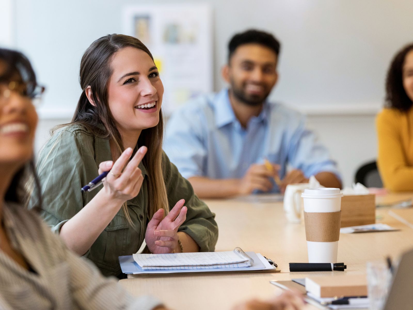 Woman in a meeting talking