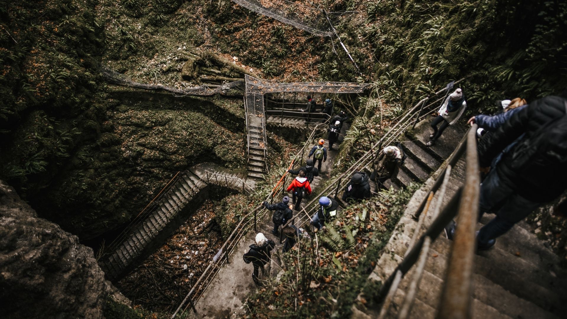 Participants going into a cave